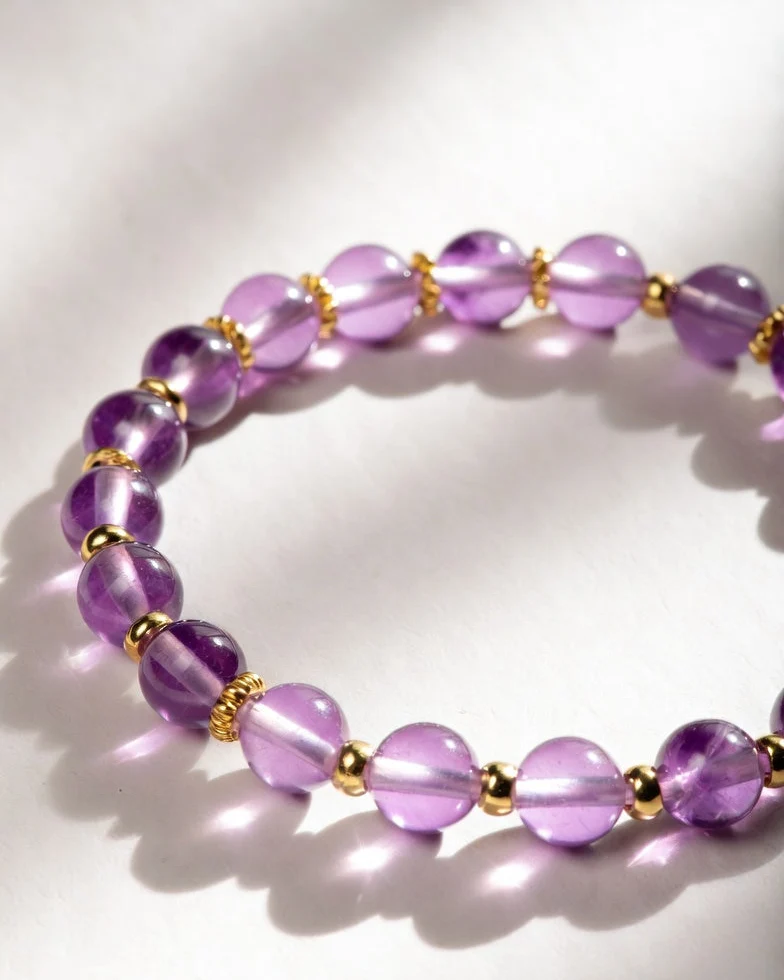 Pulsera dorada de amatista
