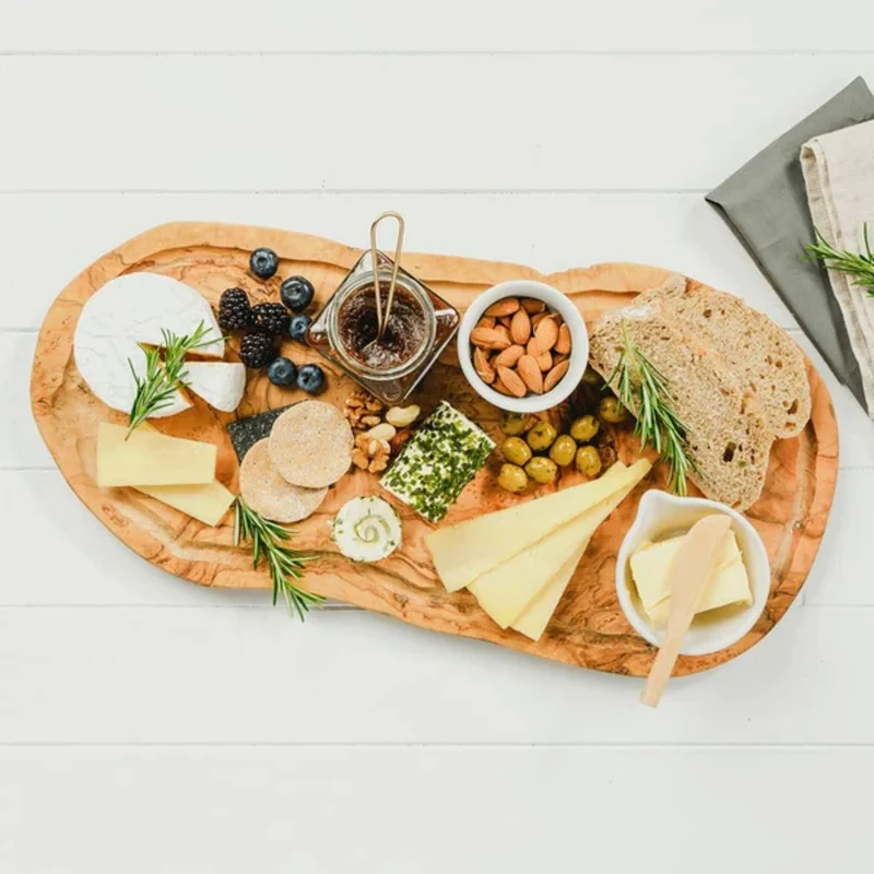 Tabla para cortar de madera de olivo con ranura para jugos Selbrae
